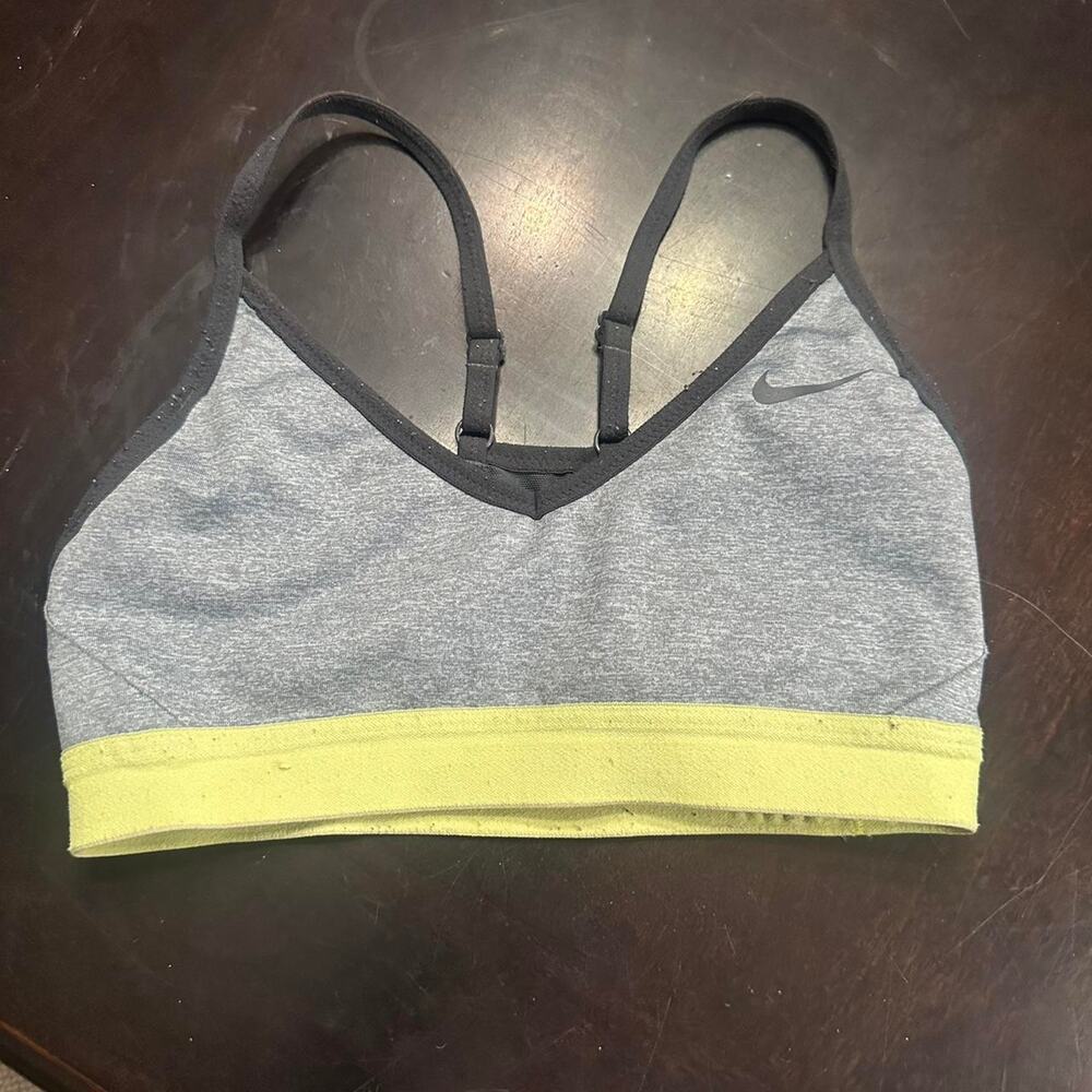 Grey and yellow nike sports
